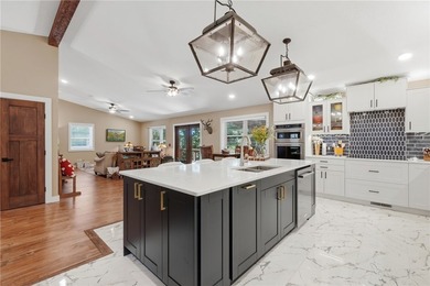 Completely remodeled with character, charm, & functionality in - photo 13