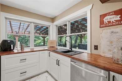 Completely remodeled with character, charm, & functionality in - photo 16