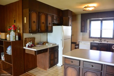 Opportunity awaits you with this 70's retro lake home. This year - photo 11