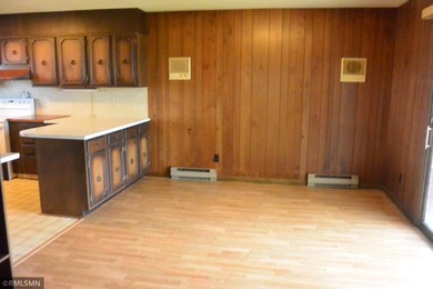 Opportunity awaits you with this 70's retro lake home. This year - photo 19
