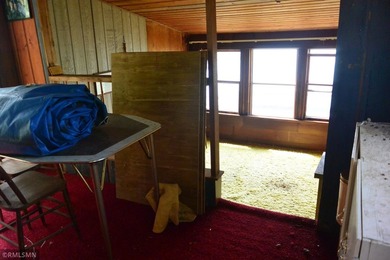 Opportunity awaits you with this 70's retro lake home. This year - photo 36