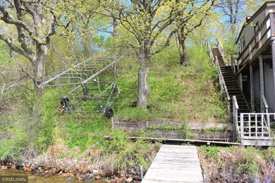 Opportunity awaits you with this 70's retro lake home. This year - photo 37