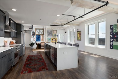Step into refined downtown living with Unit 600 at The Alston, a
