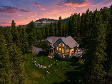 Tucked away on a private, 1.17-acre hilltop lot in the coveted - photo 1