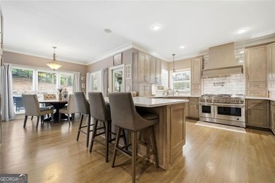 Welcome to luxury living in the prestigious Towne Lake Hills - photo 19