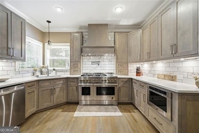 Welcome to luxury living in the prestigious Towne Lake Hills - photo 20