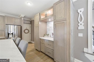 Welcome to luxury living in the prestigious Towne Lake Hills - photo 21