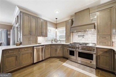 Welcome to luxury living in the prestigious Towne Lake Hills - photo 26