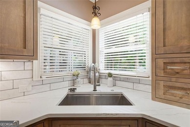 Welcome to luxury living in the prestigious Towne Lake Hills - photo 27