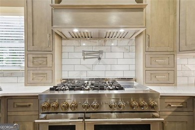 Welcome to luxury living in the prestigious Towne Lake Hills - photo 28