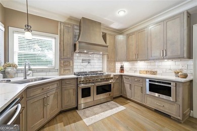 Welcome to luxury living in the prestigious Towne Lake Hills - photo 29