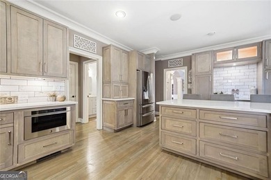 Welcome to luxury living in the prestigious Towne Lake Hills - photo 31