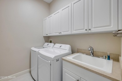 This beautifully updated 4-bedroom, 3-bath pool home is - photo 32