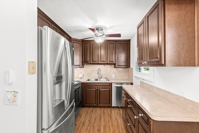 STEP INTO YOUR FIRST-FLOOR DREAM CONDO IN AN ACTIVE 55 + - photo 3