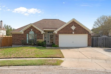 This charming 3-bedroom, 2-bath home is tucked away on a quiet