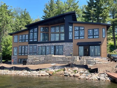 Welcome to Your Stunning New Lake Home on Highly Sought After - photo 1