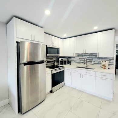 Century Village Lake Condo For Sale in West Palm Beach Florida