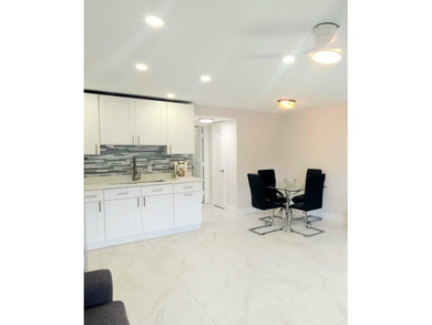 Spectacular renovated 1st floor condo in the active 55 community - photo 4