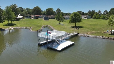 Located in Malcolm Creek on Kentucky Lake in Benton, KY, this - photo 12