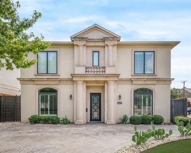 Set on a prominent corner lot, 4085 Amherst Avenue makes an