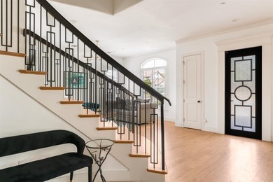 Set on a prominent corner lot, 4085 Amherst Avenue makes an