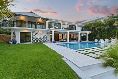 Set on one third of an acre with 90 feet of seawall just off the - photo 6
