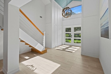 Set on one third of an acre with 90 feet of seawall just off the - photo 9