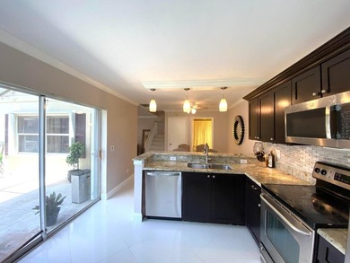 Beautiful upgraded townhome, from the time you walk in you are - photo 4
