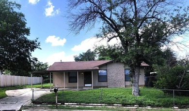 *MOVE IN READY* Nestled on a cul-de-sac with mature trees, this - photo 1