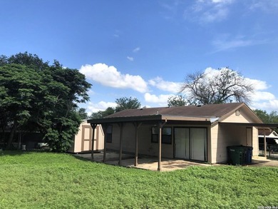 *MOVE IN READY* Nestled on a cul-de-sac with mature trees, this - photo 2