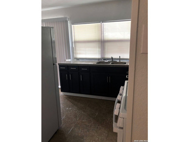 *MOVE IN READY* Nestled on a cul-de-sac with mature trees, this - photo 6