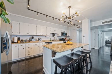 This gorgeous downtown unit at The Cliff House is a great find