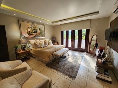 We are pleased to present this stunning home in Altos del Golf - photo 3