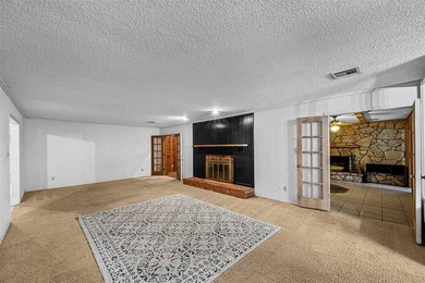 An uncommon opportunity awaits with this spacious and versatile