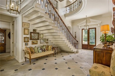 Hidden beyond a gated, winding drive in the heart of - photo 11