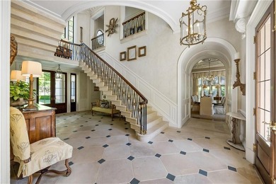 Hidden beyond a gated, winding drive in the heart of - photo 12