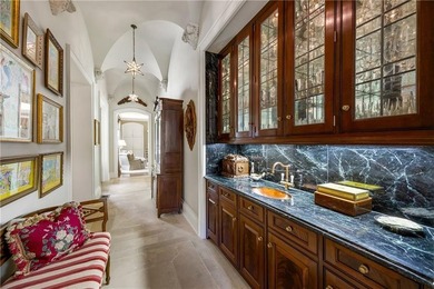 Hidden beyond a gated, winding drive in the heart of - photo 32