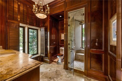 Hidden beyond a gated, winding drive in the heart of - photo 38