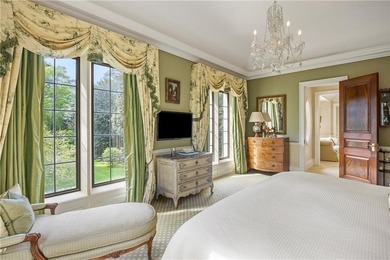 Hidden beyond a gated, winding drive in the heart of - photo 43