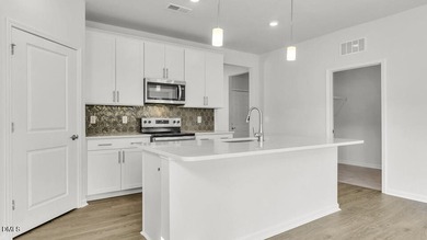 Located at 365 Alexis Loop in The Villas at Galvins Ridge, this - photo 9