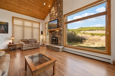 Set against the peaceful backdrop of wetlands and a flowing - photo 10
