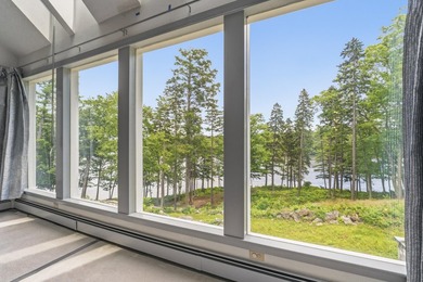 Nestled along the shore of the Kennebec River, this private 3BR - photo 4