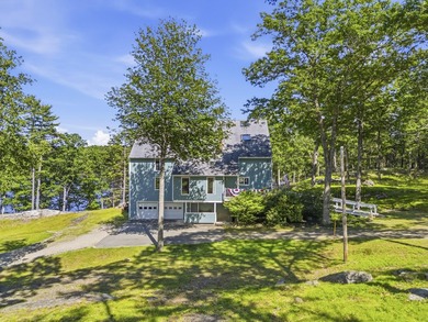 Nestled along the shore of the Kennebec River, this private 3BR - photo 10