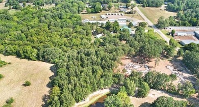 Over 5 acres waiting to be developed! Situated within minutes of - photo 5