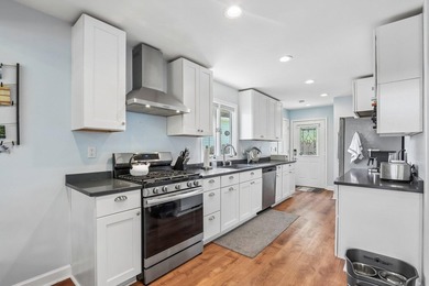 Presenting the Lake Home you've been waiting for! Renovated from - photo 5