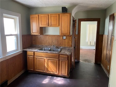 Opportunity knocks at 332 Carter Street! This income-producing - photo 3