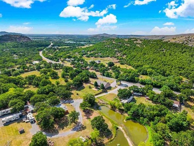 This cozy Medicine Park home has it all: Serene views of the - photo 4