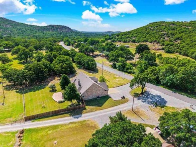 This cozy Medicine Park home has it all: Serene views of the - photo 5