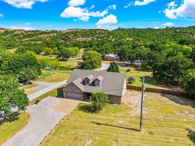 This cozy Medicine Park home has it all: Serene views of the - photo 8
