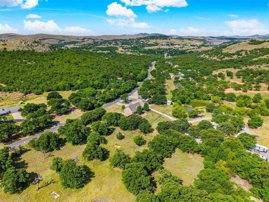 This cozy Medicine Park home has it all: Serene views of the - photo 9